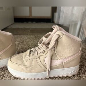 Nike Women’s High-Top Sneakers in Beige with Pink Accents
